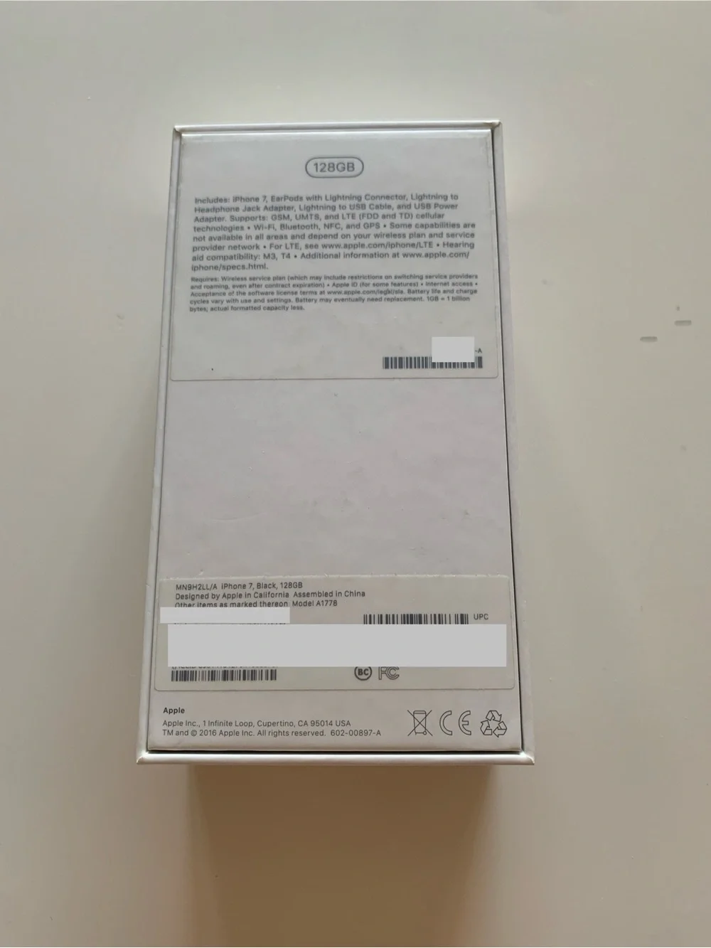 Empty iPhone 7 Box and Apple Stickers